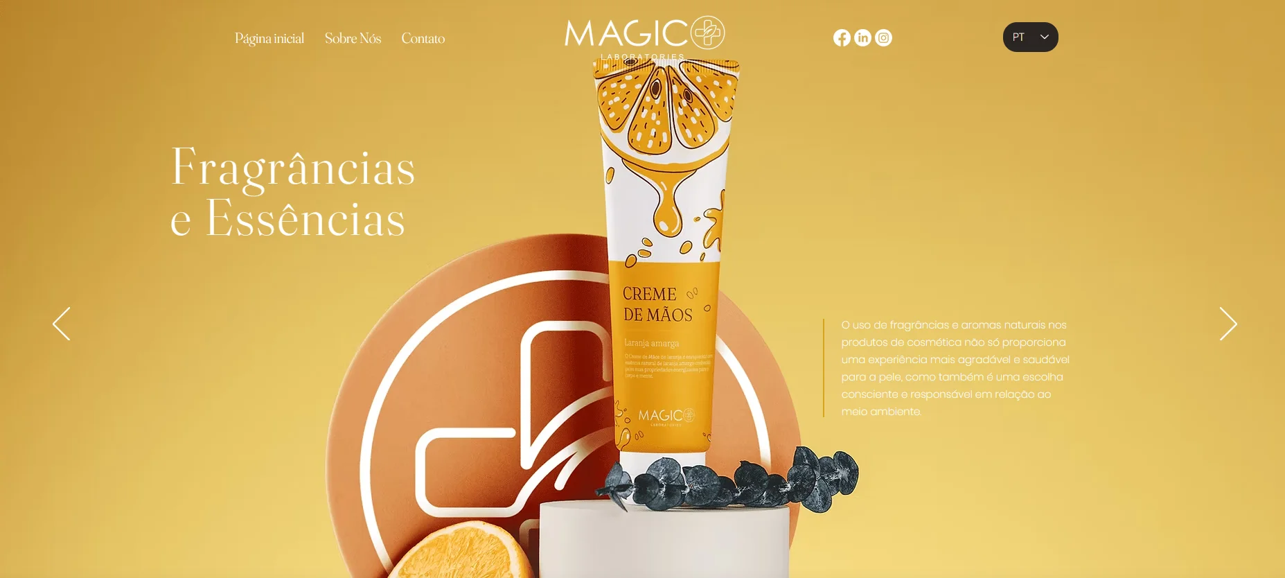 Tube of orange-scented hand cream displayed against a warm background with fruit and green foliage accents.
